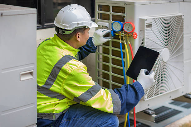 Professional Air Conditioning Repair technician working in Montezuma, NY